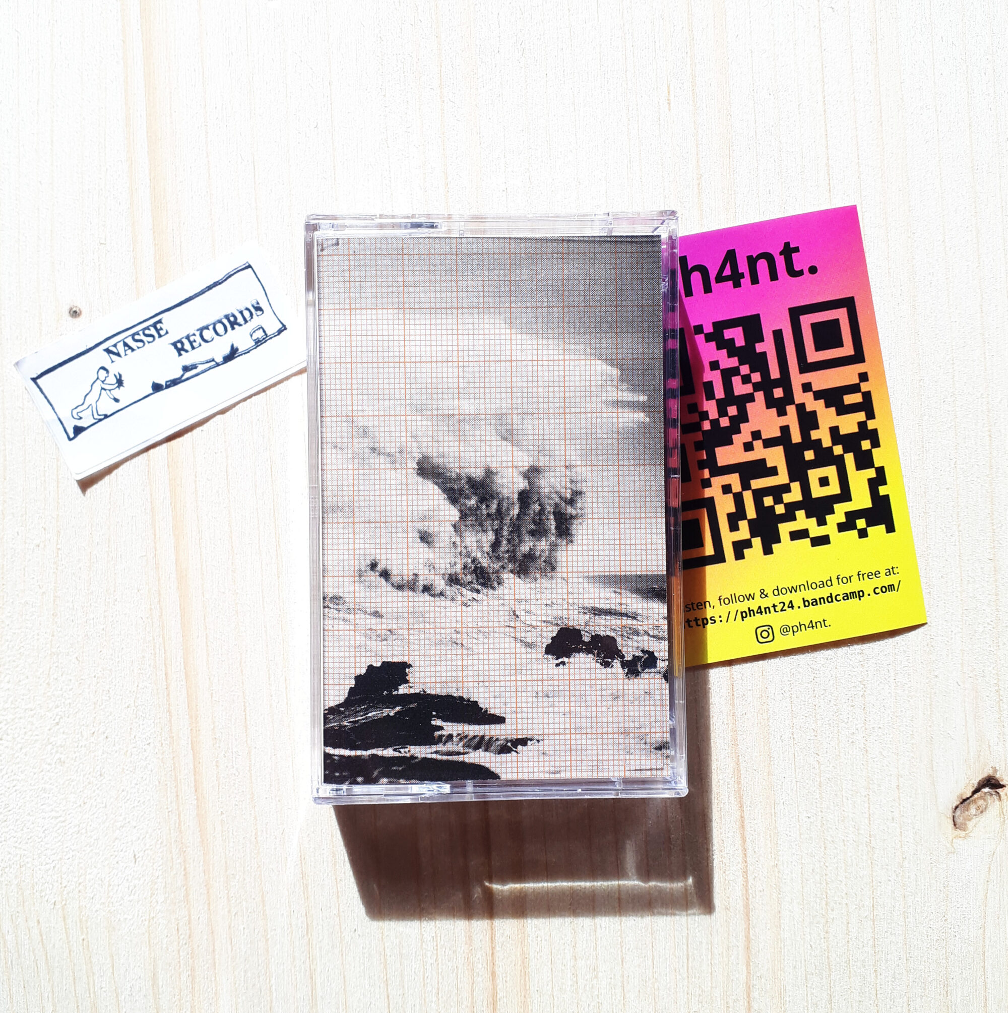 Picture of music cassette ph4nt. - 2047. Front cover and some stickers are shown